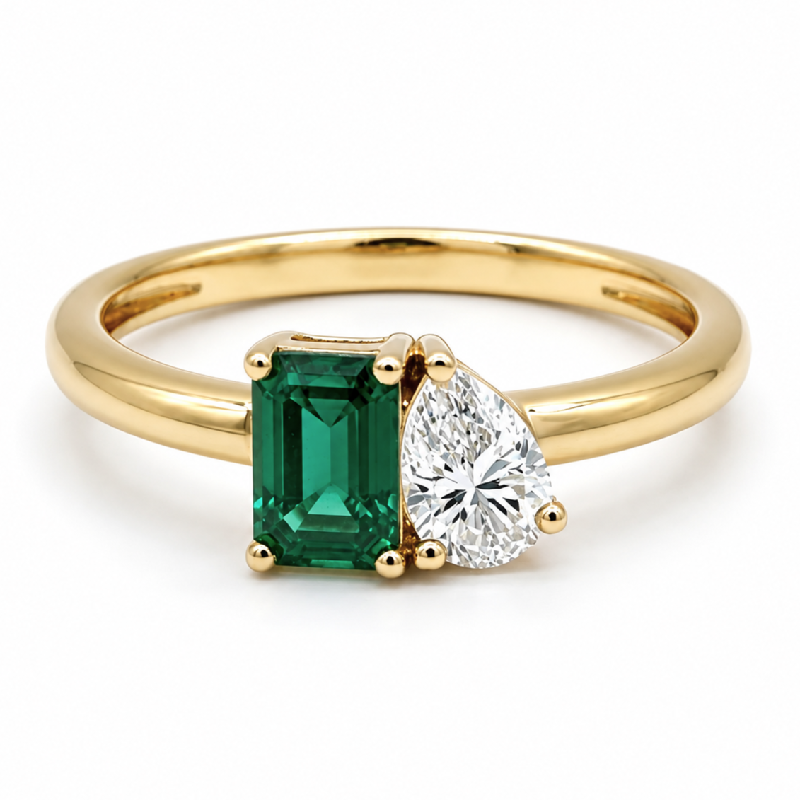 Emerald and Pear-Cut Two-Stone Ring in Yellow Gold