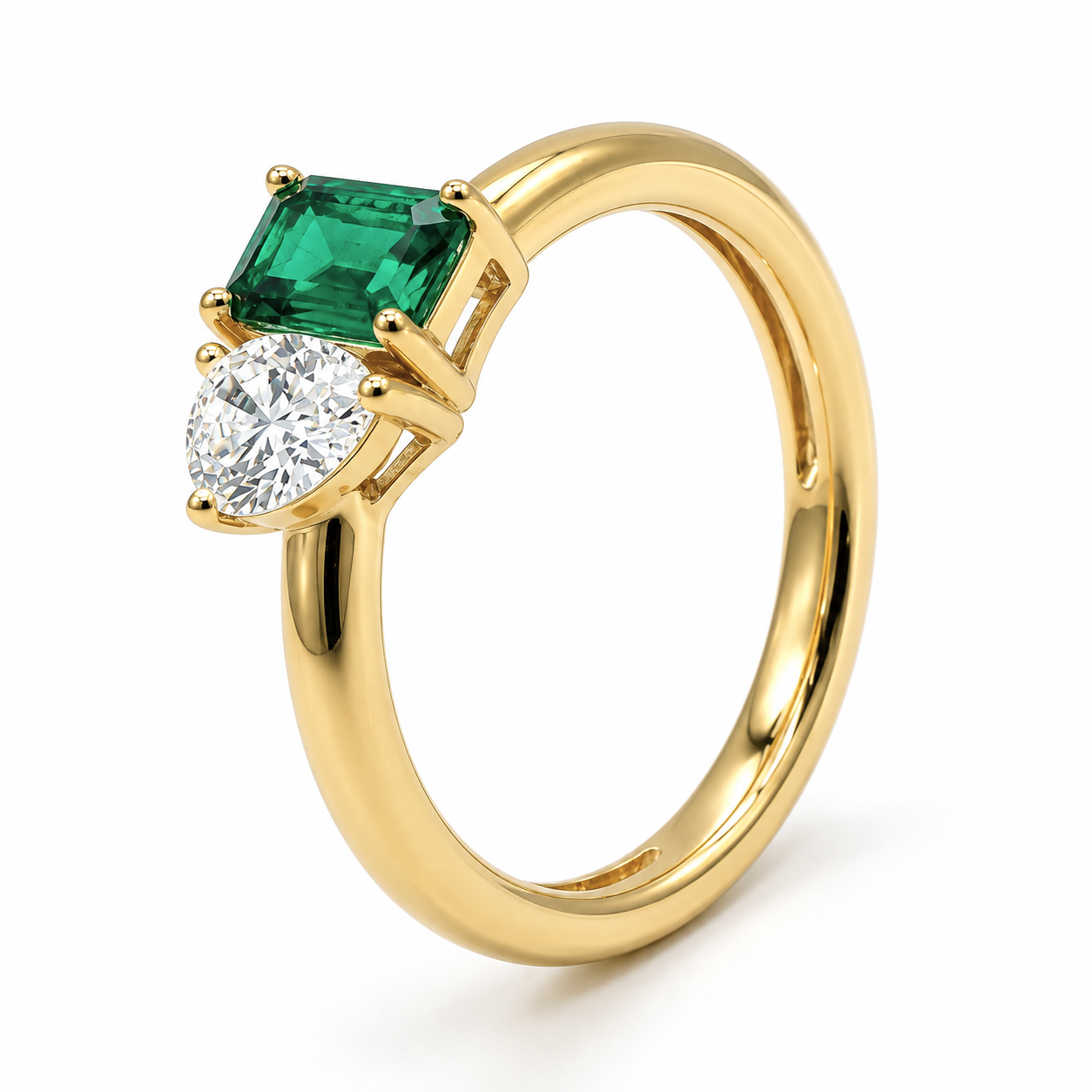 Emerald and Pear-Cut Two-Stone Ring in Yellow Gold